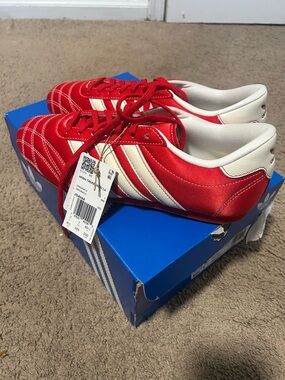 Adidas taekwondo sneaker in the “better scarlet” colorway